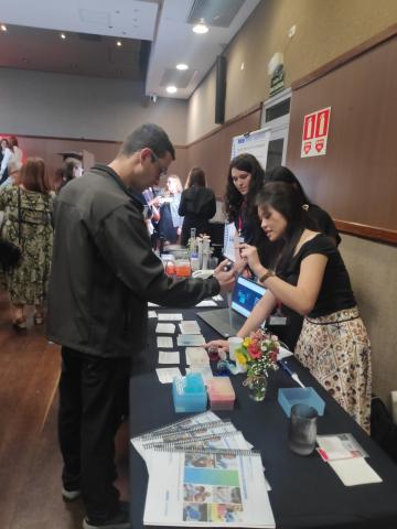 ABE Brazil team showing our resources to new teachers at ou celebration of the 1 millionth student